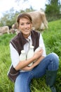 Portrait of woman breeder in countryside