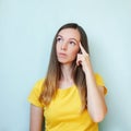 Portrait woman brunette on blue background