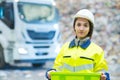 portrait woman carrying recycling bin Royalty Free Stock Photo