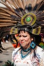 Portrait of a woman in a colorful costume during the annual dancing parade for the city's holidays