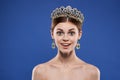 portrait of a woman with a crown on her head makeup model hand gesture close-up lifestyle