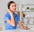 Portrait of woman customer service worker, call center smiling operator with phone headset isolated on white background Royalty Free Stock Photo