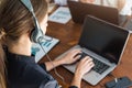 Portrait of woman customer service worker, call center smiling operator with phone on office Royalty Free Stock Photo