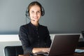 Portrait of woman customer service worker, call center smiling operator with phone on office Royalty Free Stock Photo