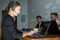 Portrait of woman customer service worker, call center smiling operator with phone on office Royalty Free Stock Photo