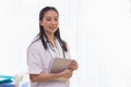 Portrait of woman doctor standing in Patient Room at hospital. looking at camera Royalty Free Stock Photo