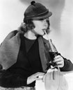 Portrait of woman drinking from bottle of soda