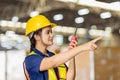 Portrait woman engineer worker supervisor radio control loading work in factory warehouse inventory as manager Royalty Free Stock Photo