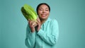 Portrait of a woman enjoying flavorous salad greens