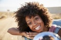 Portrait Of Woman Enjoying Road Trip In Open Top Classic Car Royalty Free Stock Photo