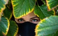 Beautiful woman eyes in naturel frame, face covered black respirator Royalty Free Stock Photo