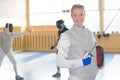 Portrait woman in fencing clothing