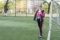 Portrait of woman at the football goal Royalty Free Stock Photo