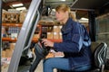 portrait woman forklift operator