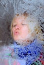 Portrait of Woman through Frosty Window