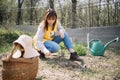 Portrait of woman gardening in vegetable garden