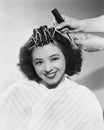 Portrait of woman having hair styled Royalty Free Stock Photo