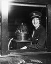 Portrait of woman at helm of boat