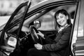 Portrait of woman in his new car. Black and white photo. Royalty Free Stock Photo