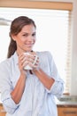 Portrait of a woman holding a cup of tea Royalty Free Stock Photo