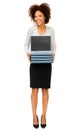 Portrait of a woman holding laptops Royalty Free Stock Photo
