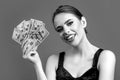 Woman with dollars in hand. Portrait woman holding money banknotes. Girl holding cash money in dollar banknotes. Woman Royalty Free Stock Photo