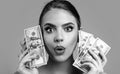 Portrait woman holding money banknotes. Girl holding cash money in dollar banknotes. Woman holding lots of money in Royalty Free Stock Photo