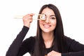 Portrait of a woman holding sushi roll on white background Royalty Free Stock Photo