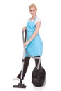 Portrait of woman holding vacuum cleaner Royalty Free Stock Photo