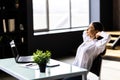 Portrait of woman at home conected with laptop at office