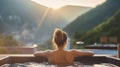 Portrait of woman at hot tub during enjoying traveling moment vacation, against the background of green big mountains. Generative Royalty Free Stock Photo