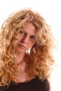 Portrait of a woman with long blonde curly hair