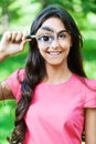 Portrait woman magnifying glass Royalty Free Stock Photo