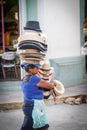 portrait of woman from Nicaragua, selling hats on the street