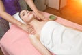 Portrait of woman patient in ayurveda spa wellness center lying relaxed Royalty Free Stock Photo