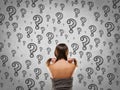 Portrait of woman pulling hair with interogation point Royalty Free Stock Photo
