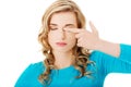 Portrait of a woman rubbing eyes Royalty Free Stock Photo