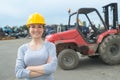 Portrait woman in salvage yard Royalty Free Stock Photo