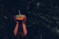 Portrait woman scary ghost in forest he has holding pumpkin