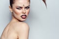 portrait of a woman Scorpion fashion glamor hairstyle studio model