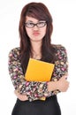 Portrait of woman scowling and hugged blank books, isolated on w