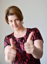 Portrait of woman showing gesture that everything is fine Royalty Free Stock Photo