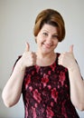 Portrait of woman showing gesture that everything is fine Royalty Free Stock Photo