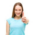 Portrait of a woman showing thumbs up sign and smiling isolated Royalty Free Stock Photo
