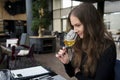 Portrait of woman drinking wine in restaurant Royalty Free Stock Photo