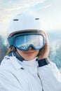 Portrait Of Woman At The Ski Resort On The Background Of Mountains And Sky. Close Up Of The Ski Goggles Of A Girl With The Reflect Royalty Free Stock Photo