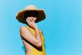 Woman beauty hat yellow smile summer swimsuit hand portrait trendy fashion