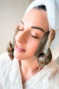 Portrait of woman with snails on her face Royalty Free Stock Photo