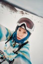 Portrait of woman on a snow-covered ski slope Royalty Free Stock Photo