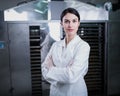 Female engineer in front of Food Dryer Dehydrator Machine Royalty Free Stock Photo